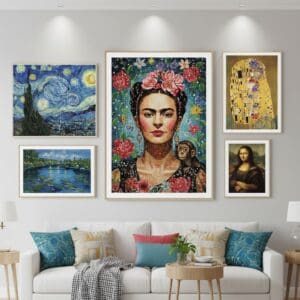 A stylish gallery wall in a living room featuring 3-4 framed diamond paintings of famous artworks.